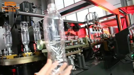 Pomarańczowa maszyna do wydmuchiwania PET z 4 wnękami 6000 bph z rozdmuchiwaniem z rozciąganiem